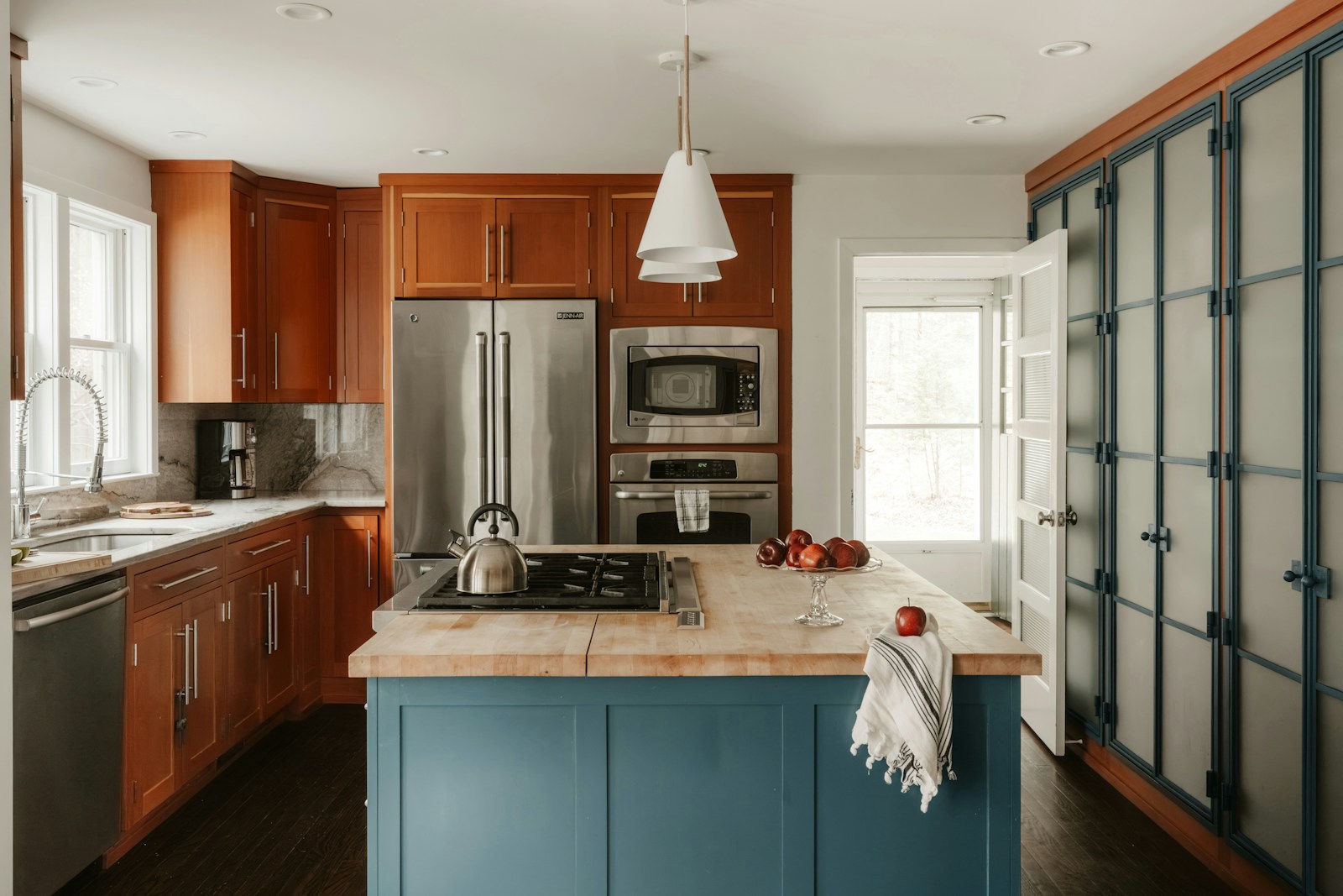 Maytag dishwasher interior with spray arms and filter