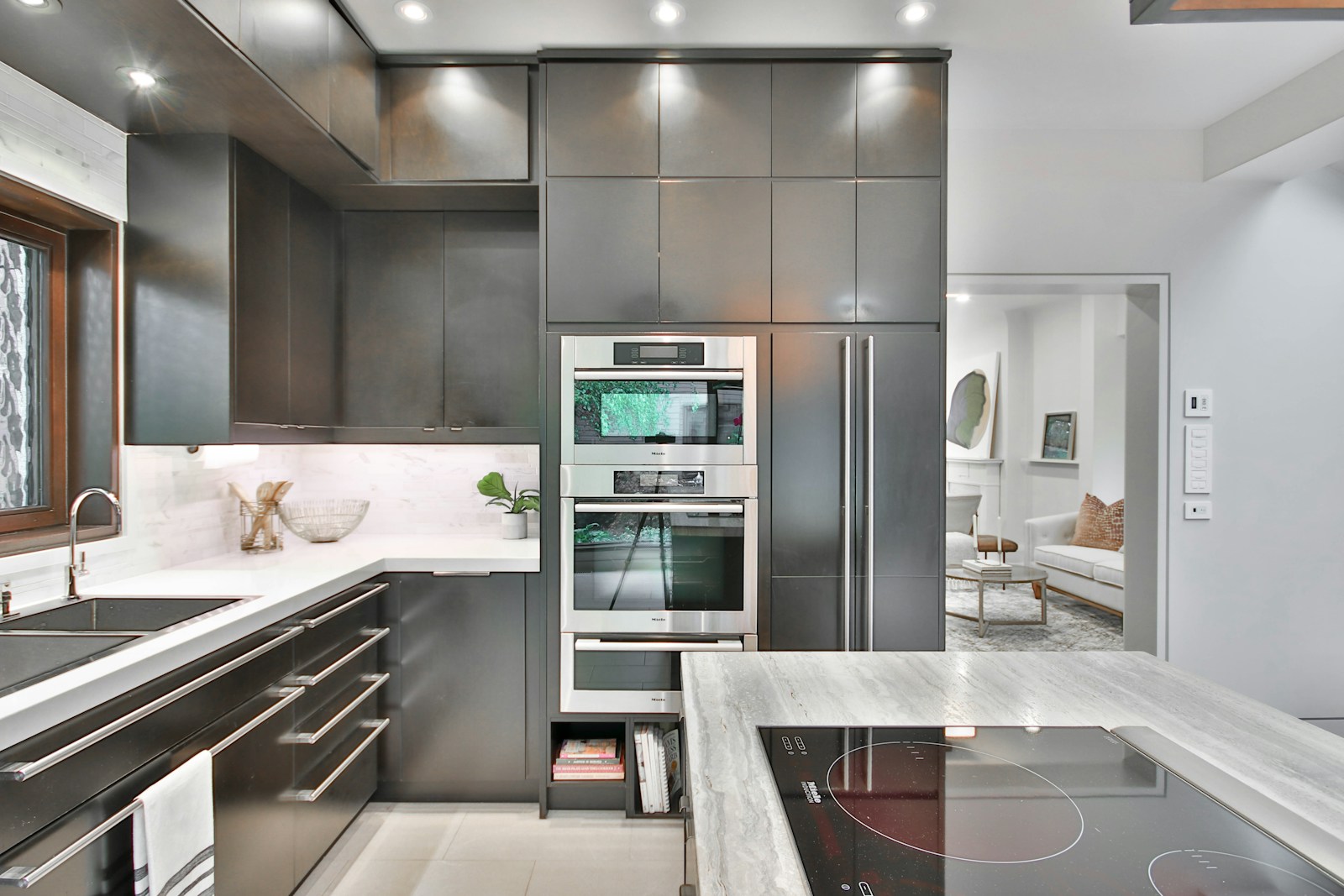 Maytag gas range with continuous grates in modern kitchen