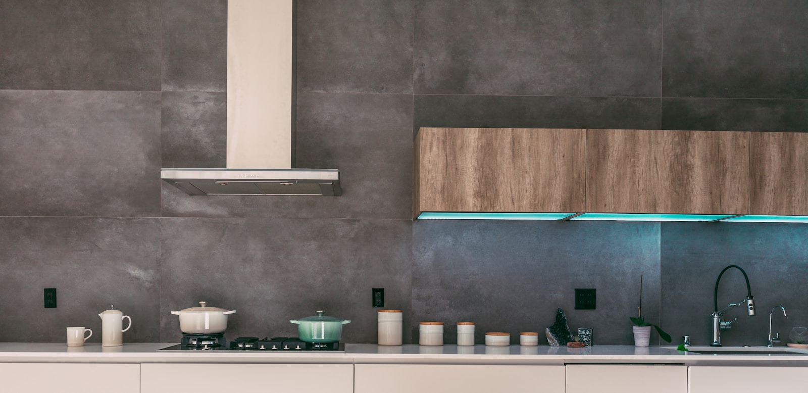 Maytag range hood with LED lighting in modern kitchen